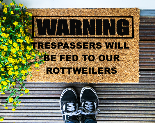 Warning, trespassers may be fed to our Rottweilers - Coir Doormat