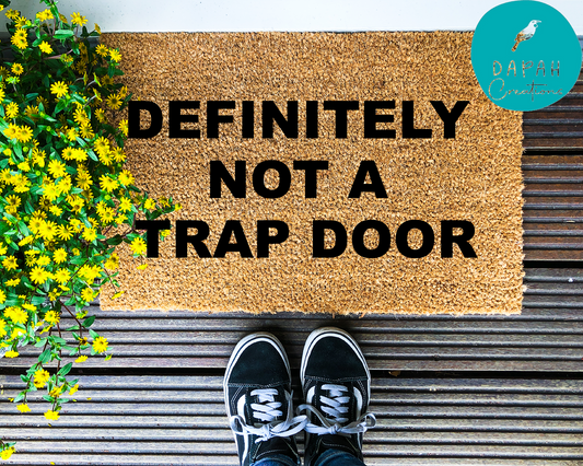 Definitely not a trap door - Coir Doormat