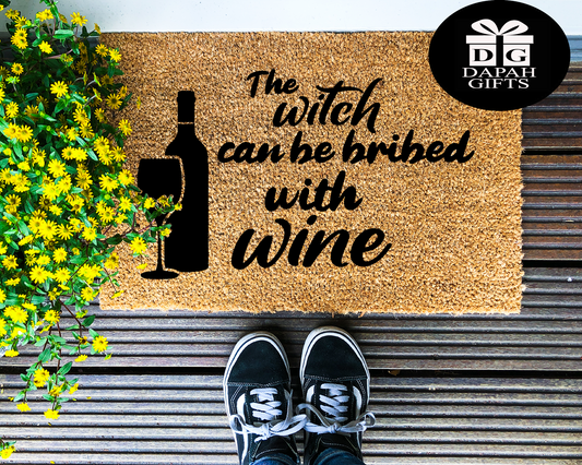 The witch can be bribed with wine - Coir Doormat - DAPAH Gifts